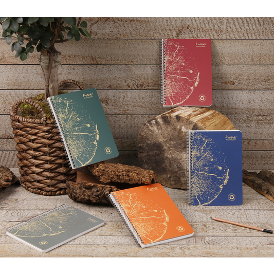 Set of notebooks with star map design on a wooden surface